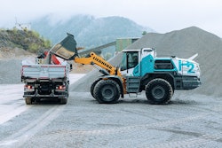 Liebherr L 566 H hydrogen wheel loader loads a truck at a quarry