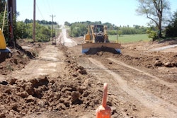 Caterpillar dozer grading a new road