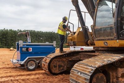 Western Global DEF550 DEFCube refilling an excavator