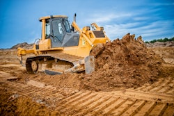 generic yellow dozer pushing dirt