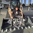 Metallica lead singer and guitarist James Hetfield with his specially designed Case TV450B compact track loader.