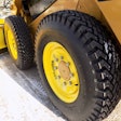 SnowWolf Wolfpaw tires on a skid steer