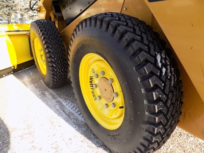 SnowWolf Wolfpaw tires on a skid steer