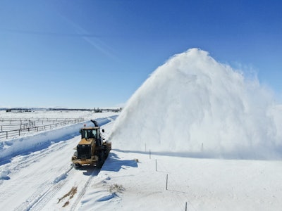 hitchdoc hds9200 snowblower on cat wheel loader blowing snow