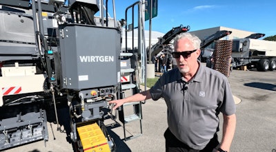 jim holland at rear of wirtgen sp 33