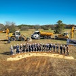 executives and city officials breaking ground in Mississippi