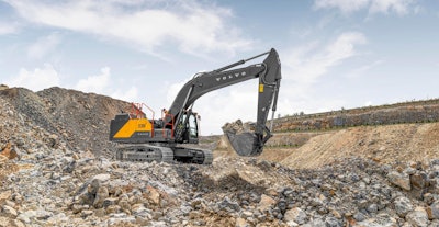 volvo ec300 excavator on rubble pile in quarry