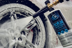 a tire being washed with a wr performance cannon