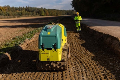 Construction worker operating an Ammann ARR 1575-2 Trench Roller