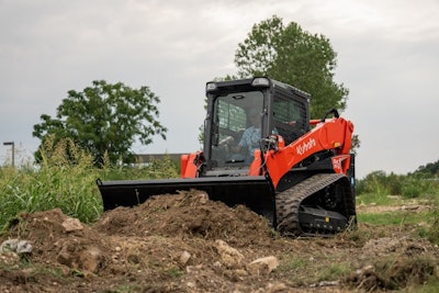 Kubota svl97-3 compact track loader pushing dirt