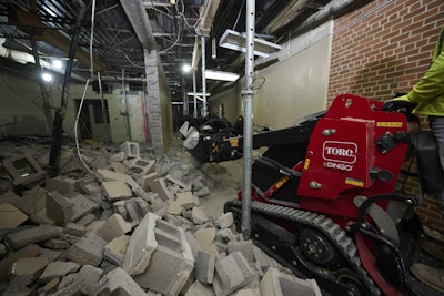 Toro eDingo TX 750 mini skid steer in concrete rubble