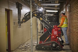 Toro eDingo TX750 using breaker to demolish interior wall