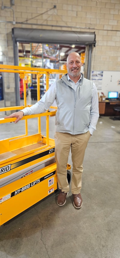 david porter leans on a machine