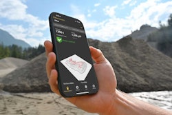 a hand holds an iphone with the SR Measure app open