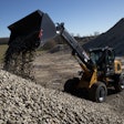 a wolf wl825t wheel loader moves material