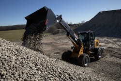 a wolf wl825t wheel loader moves material