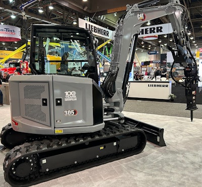 Cat Centennial Grey CR 305 Mini Excavator displayed World of Concrete