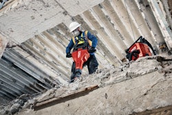 Hilti cordless TE200 Jackhammer breaking concrete on upper floor