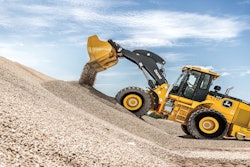 John Deere 644 P-Tier Wheel Loader dumping gravel