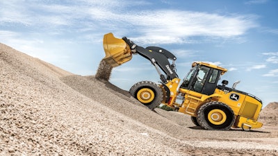 John Deere 644 P-Tier Wheel Loader dumping gravel
