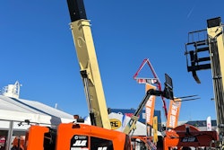 JLG EC600AJ articulating boom lift with platform raised