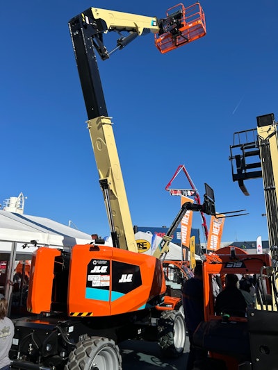 JLG EC600AJ articulating boom lift with platform raised