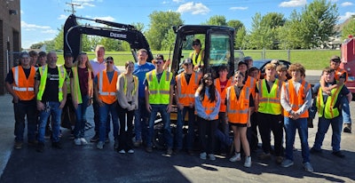 Johnsburg High students in CTE program with new Deere mini excavator