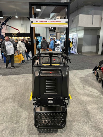 toro electric Ultra Buggy demonstrated fitting through doorway at World of Concrete