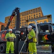 two workers using the Ditch Witch W8 hydrovac truck