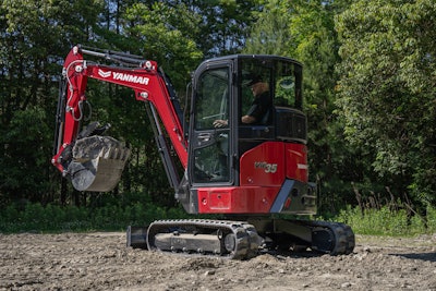 Yanmar ViO35-7 excavator scooping dirt