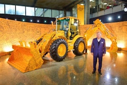 chairman bamford with his special edition backhoe