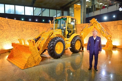 chairman bamford with his special edition backhoe