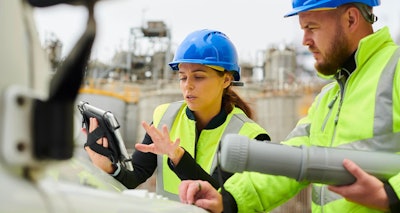 man and woman working on jobsite
