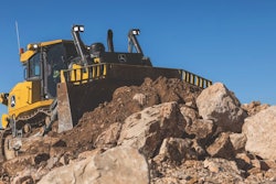 a deere dozer moves dirt