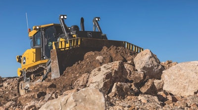 a deere dozer moves dirt