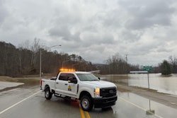 truck in front of flooded road