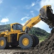 a komatsu wheel loader moves dirt