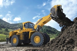 a komatsu wheel loader moves dirt