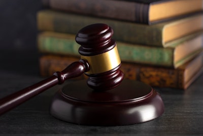 stock image of gavel on desk