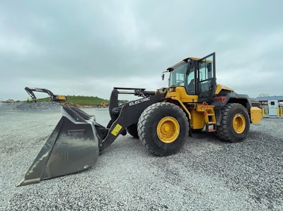 a volvo wheel loader parked on gravel lot