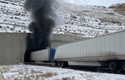 trucks outside the burning tunnel
