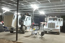 white trucks in garage at night at Florida chop shop
