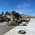 crews repairs the big mac bridge