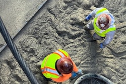 men pouring c-crete