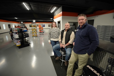 people in a hills machinery store