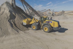 Komatsu WA485-11 wheel loader loading at dirt pile in quarry