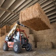 JLG AG313 Telehandler moving hay bales
