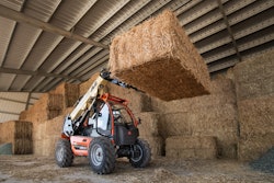 JLG AG313 Telehandler moving hay bales