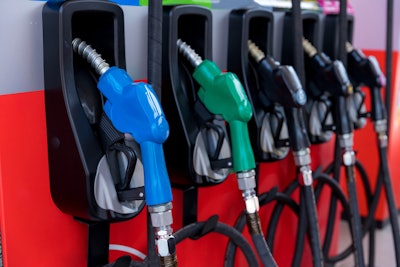 line of gas pumps stock image