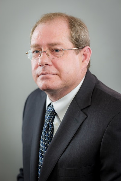 travis mullins headshot